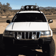Load image into Gallery viewer, Jeep Grand Cherokee WJ Roof Mounted Tire Carrier Free US Shipping