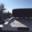 Load image into Gallery viewer, Jeep Grand Cherokee WJ Roof Mounted Tire Carrier Free US Shipping
