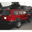 Load image into Gallery viewer, Jeep Cherokee XJ Roof Mounted Tire Carrier Free US Shipping