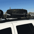 Load image into Gallery viewer, Jeep Grand Cherokee WJ Roof Mounted Tire Carrier Free US Shipping
