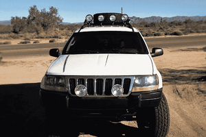 Jeep Grand Cherokee WJ Roof Mounted Tire Carrier Free US Shipping