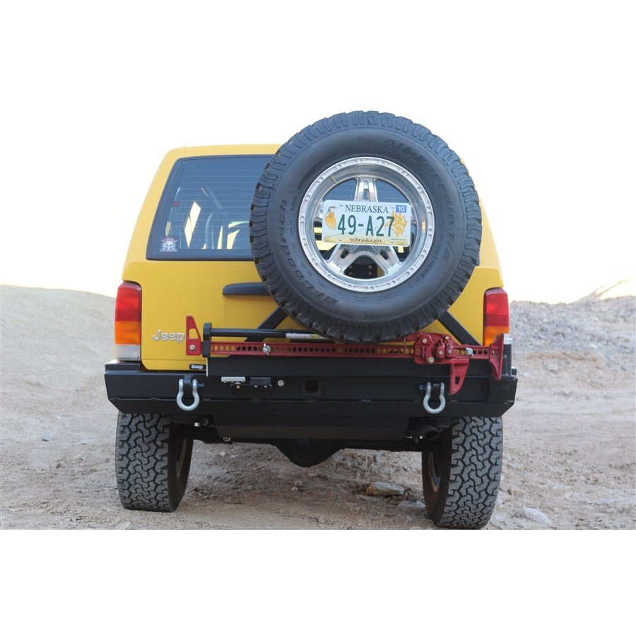 ROCK HARD 4X4™ PATRIOT SERIES REAR BUMPER W/ TIRE CARRIER FOR BUSHWACKER™ FLAT FLARES FOR JEEP CHEROKEE XJ 1984 - 2001