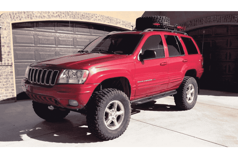 Jeep Grand Cherokee WJ Roof Mounted Tire Carrier Free US Shipping