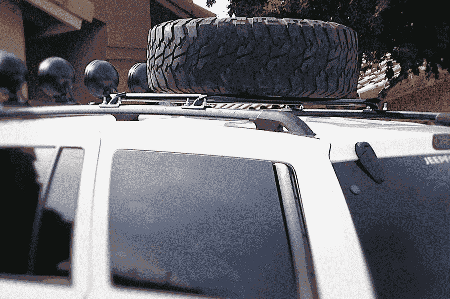 Jeep Grand Cherokee WJ Roof Mounted Tire Carrier Free US Shipping